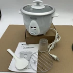 Kitchen Gourmet Rice Cooker/electric/cook/warm With Lever Model RC-3 New. Fixed Price $24.95.
