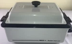 Nesco 4QT Non-stick Electric Roaster Oven Model 4104-04 White. Fixed Price $39.99.