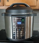 Farberware WM-CS6004W 6-QT 7-PROGRAM 1000W Programmable Pressure Cooker. Fixed Price $45.00.