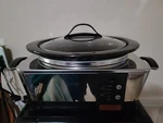Crock-pot Model SCCPTP600- Quart Stainless Steel Programmable Oval Slow Cooker. Fixed Price $105.00.