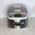 Zojirushi NS-LAC05 Electric Rice Cooker White/silver 2 Cups Inner Pot Lid. Fixed Price $54.99.