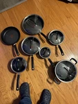 Tefal Non-stick Seven-piece Pan Set With Lids, Black, Dishwasher Safe. Fixed Price $200.00.