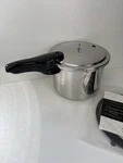 Presto Pressure Cooker Qt 0124001 W/ Jiggler & Trivet Insert. Fixed Price $54.99.