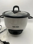 Aroma Housewares ARC-743-1NG Cup Small Pot Style Rice Cooker White. Fixed Price $13.89.