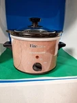Elite Cuisine 1.5QT Slow Cooker--football-model MST-250FB. Fixed Price $25.00.
