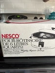 Nesco 6 Qt Blue Roaster Oven. Fixed Price $49.99.