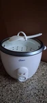 Oster 10-CUP Electric Rice Cooker Model 4707 With Keep Warm Function & Glass Lid. Fixed Price $17.95.