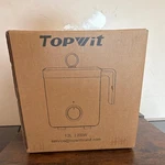Topwit XK-F1203 Rice Cooker 1.2L 200W Green With Spoon, Lid & Power Cord. Fixed Price $37.57.