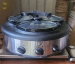 Ge 3-CROCK Round Slow Cooker Model 103734. Fixed Price $95.00.