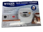 Tiger JBV-G10U Micom Rice Cooker 5.5 Cup Nonstick Japanese White New. Fixed Price $89.99.