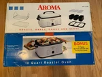 Aroma 18QT Electric Roaster Oven With 7-PIECE Buffet Server Set.. Fixed Price $50.00.