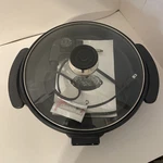 Intertek Electric Round Pizza Cooker - Cooking Pan Black And Silver. Fixed Price $19.99.