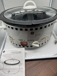 Ge 6-QUART Oval Slow Cooker Featuring Decorative Apple Pattern. Fixed Price $16.00.