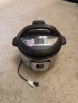 Instant Pot Duo Nova 10 Quart Electric Pressure Cooker. Fixed Price $65.00.