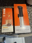 Anova Precision Cooker Sous Vide 1000W Stainless Steel With Vacuum Sealer Rolls. Fixed Price $50.00.