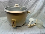 Farberware Rice Cooker With Measuring Cup, Spatula And Grate 10. Fixed Price $42.87.