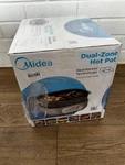 Midea MHP171KMBPB 6.3-QT Heatxpress Dual-zone Electric Non-stick Hot Pot. Fixed Price $65.00.