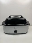 Oster Roaster Oven Quart Silver CKSTRS18-VHD-V Self-basting Lid. Fixed Price $40.00.