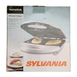 Sylvania Nonstick Electric Omelet Maker New In Box Model No. SW-086. Fixed Price $20.49.