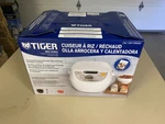 Tiger JBV-G10U 5.5-CUP Rice Cooker & Steamer Open Box. Fixed Price $89.00.