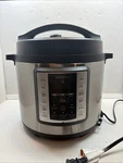 Insignia Qt. Multi-function Pressure Cooker/insta Pot Model NS-MC80SS9. Fixed Price $75.00.