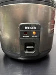 Tiger JNP-S10U-HU 5.5-CUP (uncooked) Rice Cooker & Warmer, Stainless Steel Gray.. Fixed Price $50.89.