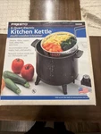 New Vintage Presto Kitchen Kettle 6 Quart Multi-cooker Steamer Factory Sealed. Fixed Price $49.00.