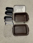Vintage Nesco 18-QUART Roastmaster Roaster Oven W/ Rack And Divider Pans. Fixed Price $85.49.