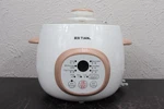 Tianji Electric Stew Pot Ceramic Soup Porridge Slow Cooker Lid White DGD10-10BAG. Fixed Price $50.00.