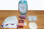Emjoi Soft Caress Epilator - 36 Gold Plated Hypoallergenic Tweezers (cordless). Fixed Price $48.95.
